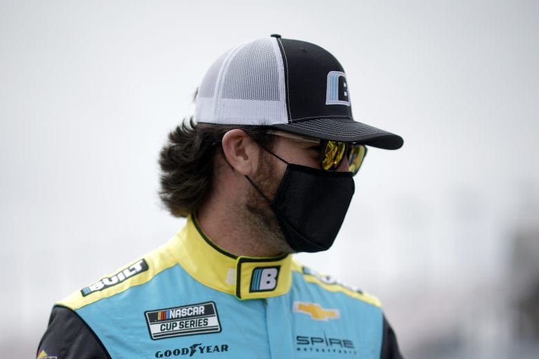 LAS VEGAS, NEVADA - MARCH 07: Corey LaJoie, driver of the #7 Built Bar Chevrolet, walks the grid prior to the NASCAR Cup Series Pennzoil 400 presented by Jiffy Lube at Las Vegas Motor Speedway on March 07, 2021 in Las Vegas, Nevada. (Photo by Chris Graythen/Getty Images) | Getty Images