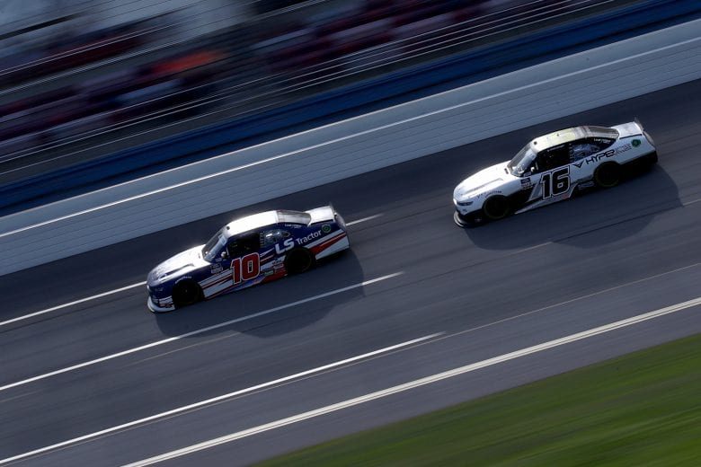 TALLADEGA, ALABAMA - APRIL 24: Jeb Burton, driver of the #10 LS Tractors Chevrolet, and AJ Allmendinger, driver of the #16 Hyperice Chevrolet, race during the NASCAR Xfinity Series Ag-Pro 300 at Talladega Superspeedway on April 24, 2021 in Talladega, Alabama. (Photo by Sean Gardner/Getty Images) | Getty Images