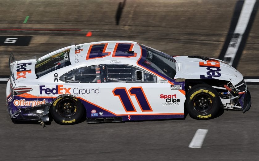 TALLADEGA, ALABAMA - APRIL 25: Denny Hamlin, driver of the #11 FedEx Ground Toyota, drives a damaged car during the NASCAR Cup Series GEICO 500 at Talladega Superspeedway on April 25, 2021 in Talladega, Alabama. (Photo by James Gilbert/Getty Images) | Getty Images
