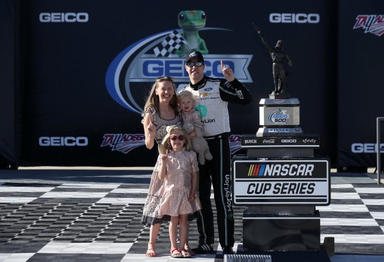 TALLADEGA, ALABAMA - APRIL 25: Brad Keselowski, driver of the #2 MoneyLion Ford, celebrates with his wife Paige and daughters Autumn and Scarlett in victory lane after winning the NASCAR Cup Series GEICO 500 at Talladega Superspeedway on April 25, 2021 in Talladega, Alabama. (Photo by Sean Gardner/Getty Images) | Getty Images