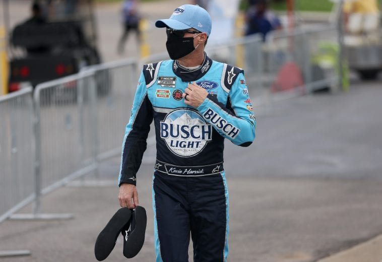 MARTINSVILLE, VIRGINIA - APRIL 11: Kevin Harvick, driver of the #4 Busch NA Ford, walks the grid prior to the NASCAR Cup Series Blue-Emu Maximum Pain Relief 500 at Martinsville Speedway on April 11, 2021 in Martinsville, Virginia. (Photo by James Gilbert/Getty Images) | Getty Images