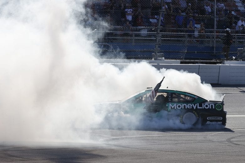 #2: Brad Keselowski, Team Penske, Ford Mustang MoneyLion, celebrates after winning.