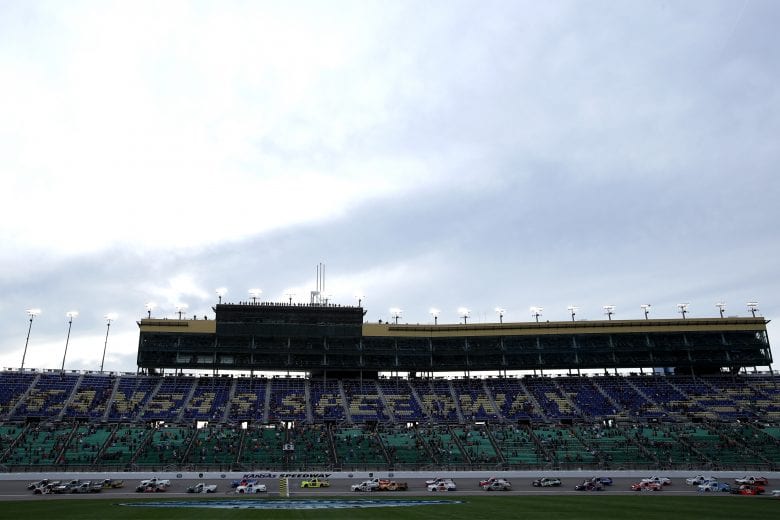 KANSAS CITY, KANSAS - MAY 01: Trucks race during the NASCAR Camping World Truck Series Wise Power 200 at Kansas Speedway on May 01, 2021 in Kansas City, Kansas. (Photo by Sean Gardner/Getty Images) | Getty Images