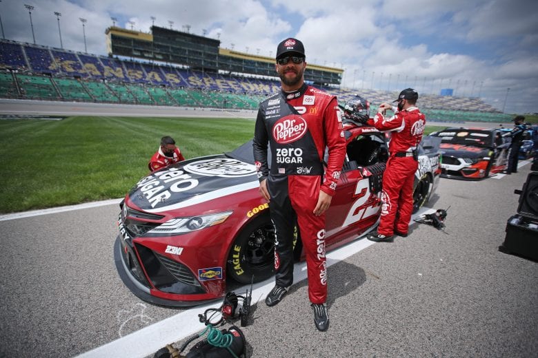KANSAS CITY, KANSAS - MAY 02: Bubba Wallace, driver of the #23 Dr. Pepper Zero Sugar Toyota, poses for photos prior to the NASCAR Cup Series Buschy McBusch Race 400 at Kansas Speedway on May 02, 2021 in Kansas City, Kansas. (Photo by Sean Gardner/23XI Racing via Getty Images)