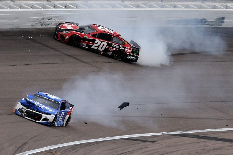 KANSAS CITY, KANSAS - MAY 02: Christopher Bell, driver of the #20 Rheem Toyota, spins into the wall after an on-track incident with Ricky Stenhouse Jr., driver of the #47 Kroger/Energizer Chevrolet, during the NASCAR Cup Series Buschy McBusch Race 400 at Kansas Speedway on May 02, 2021 in Kansas City, Kansas. (Photo by James Gilbert/Getty Images) | Getty Images