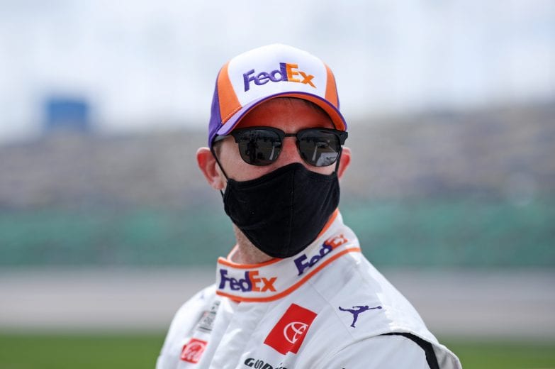 KANSAS CITY, KANSAS - MAY 02: Denny Hamlin, driver of the #11 FedEx Freight Toyota, waits on the grid prior to the NASCAR Cup Series Buschy McBusch Race 400 at Kansas Speedway on May 02, 2021 in Kansas City, Kansas. (Photo by Sean Gardner/Getty Images) | Getty Images