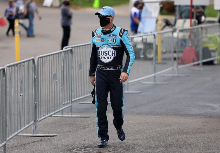 MARTINSVILLE, VIRGINIA - APRIL 11: Kevin Harvick, driver of the #4 Busch NA Ford, walks the grid prior to the NASCAR Cup Series Blue-Emu Maximum Pain Relief 500 at Martinsville Speedway on April 11, 2021 in Martinsville, Virginia. (Photo by James Gilbert/Getty Images) | Getty Images