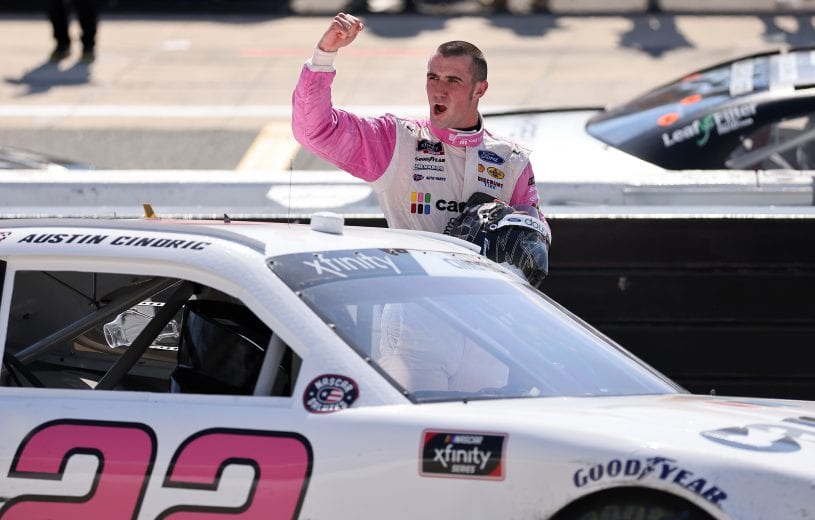 DOVER, DELAWARE - MAY 15: Austin Cindric, driver of the #22 Car Shop Ford, celebrates his win in Victory Lane during the NASCAR Xfinity Series Drydene 200 race at Dover International Speedway on May 15, 2021 in Dover, Delaware. (Photo by James Gilbert/Getty Images) | Getty Images
