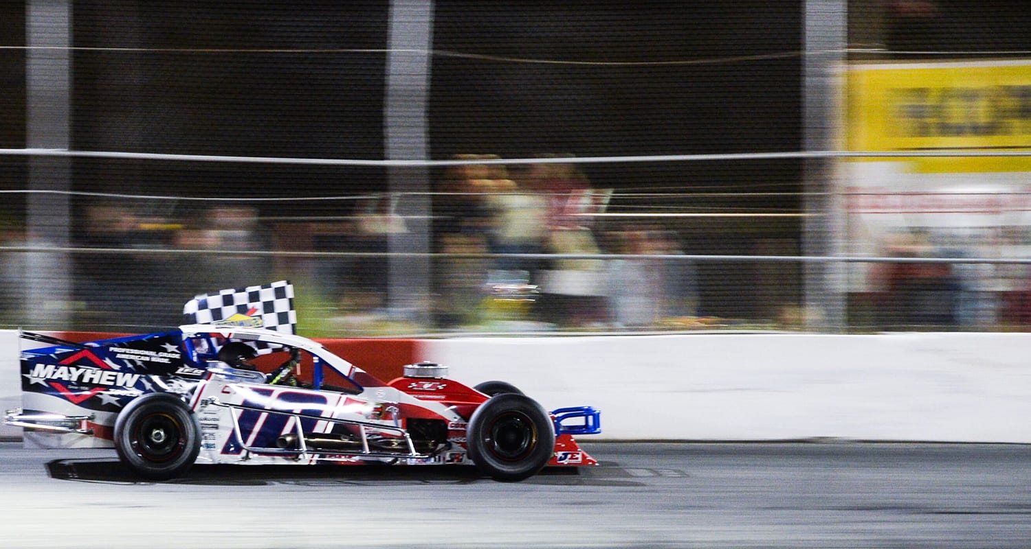 Doug Coby, driver of #10 Mayhew Tools Chevrolet takes a victory lap after winning the Miller Lite 200 for the NASCAR Whelen Modified Tour at Riverhead Raceway in Riverhead, New York on May 15, 2021. (Kathryn Riley/NASCAR)