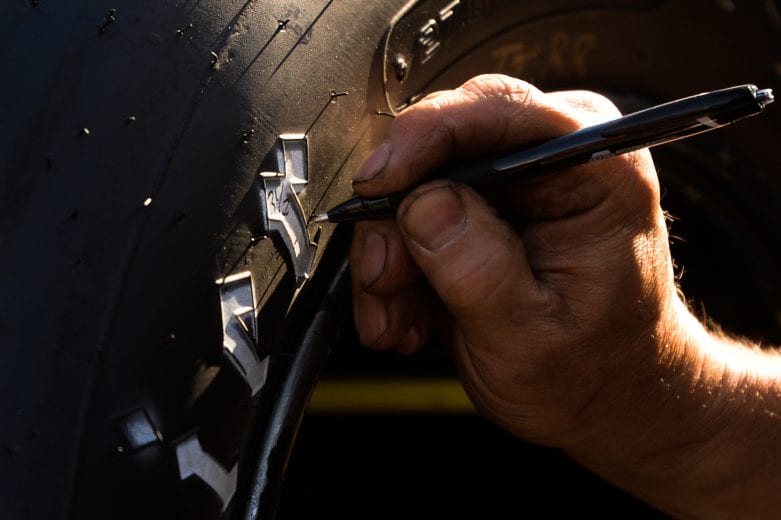 A marking is made on a Hoosier tire during the Miller Lite 200 for the NASCAR Whelen Modified Tour at Riverhead Raceway in Riverhead, New York on May 15, 2021. (Kathryn Riley/NASCAR)