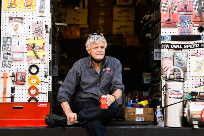 A candid portrait of a man sitting in his trailer during the Miller Lite 200 for the NASCAR Whelen Modified Tour at Riverhead Raceway in Riverhead, New York on May 15, 2021. (Kathryn Riley/NASCAR)