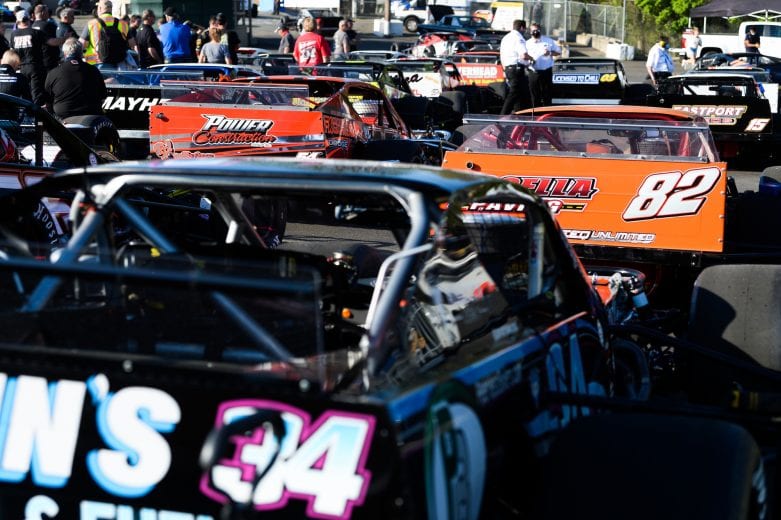 Cars lined up prior to qualifying during the Miller Lite 200 for the NASCAR Whelen Modified Tour at Riverhead Raceway in Riverhead, New York on May 15, 2021. (Kathryn Riley/NASCAR)