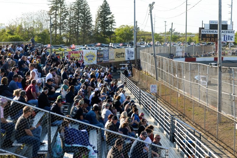 Fans watch qualifying during the Miller Lite 200 for the NASCAR Whelen Modified Tour at Riverhead Raceway in Riverhead, New York on May 15, 2021. (Kathryn Riley/NASCAR)