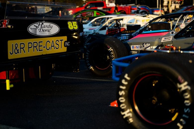 The cars lined up prior to the Miller Lite 200 for the NASCAR Whelen Modified Tour at Riverhead Raceway in Riverhead, New York on May 15, 2021. (Kathryn Riley/NASCAR)