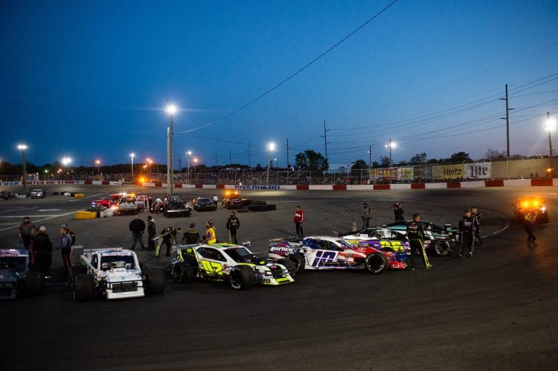 Drivers and their cars line up before the Miller Lite 200 for the NASCAR Whelen Modified Tour at Riverhead Raceway in Riverhead, New York on May 15, 2021. (Kathryn Riley/NASCAR)