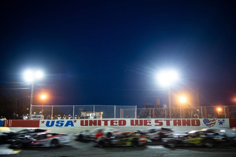 Cars race during the Miller Lite 200 for the NASCAR Whelen Modified Tour at Riverhead Raceway in Riverhead, New York on May 15, 2021. (Kathryn Riley/NASCAR)