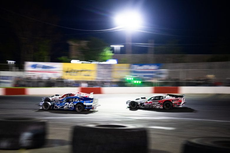 Gary McDonald, driver of #26 TBD Chevrolet drives against Patrick Emerling, driver of the #07 Captain Pip’s Marina and Hideaway Chevrolet during the Miller Lite 200 for the NASCAR Whelen Modified Tour at Riverhead Raceway in Riverhead, New York on May 15, 2021. (Kathryn Riley/NASCAR)