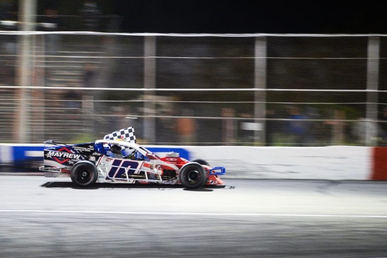 Doug Coby, driver of #10 Mayhew Tools Chevrolet takes a victory lap after winning the Miller Lite 200 for the NASCAR Whelen Modified Tour at Riverhead Raceway in Riverhead, New York on May 15, 2021. (Kathryn Riley/NASCAR)