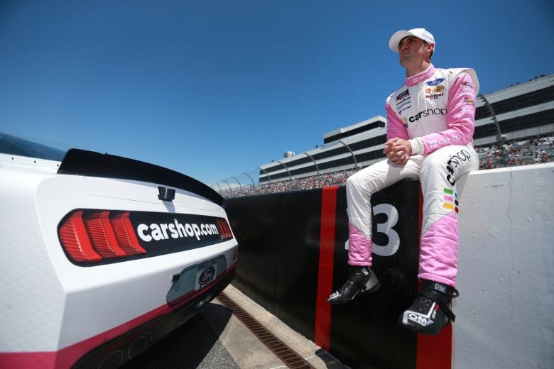 DOVER, DELAWARE - MAY 15: Austin Cindric, driver of the #22 Car Shop Ford, walks the grid during the NASCAR Xfinity Series Drydene 200 race at Dover International Speedway on May 15, 2021 in Dover, Delaware. (Photo by Sean Gardner/Getty Images) | Getty Images