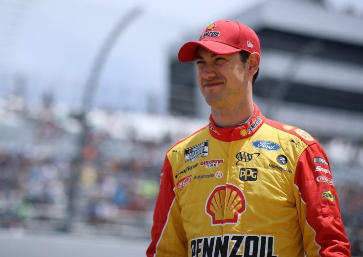DOVER, DELAWARE - MAY 16: Joey Logano, driver of the #22 Shell Pennzoil Ford, walks the grid during the NASCAR Cup Series Drydene 400 at Dover International Speedway on May 16, 2021 in Dover, Delaware. (Photo by Sean Gardner/Getty Images) | Getty Images