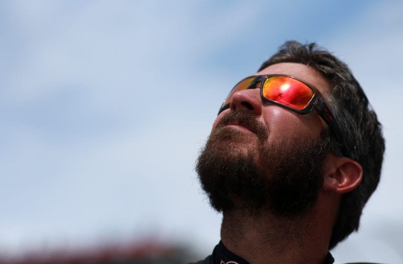 DOVER, DELAWARE - MAY 16: Martin Truex Jr., driver of the #19 Reser's Fine Foods Toyota, watches the flyover during the NASCAR Cup Series Drydene 400 at Dover International Speedway on May 16, 2021 in Dover, Delaware. (Photo by Sean Gardner/Getty Images) | Getty Images