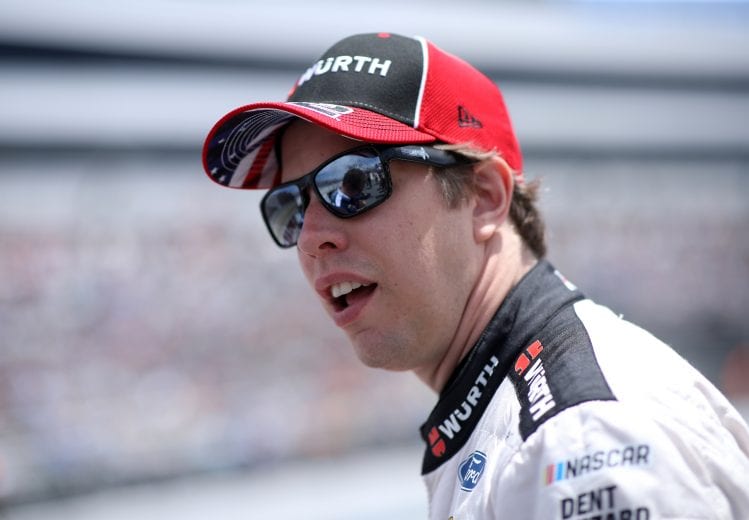 DOVER, DELAWARE - MAY 16: Brad Keselowski, driver of the #2 Wurth/UTI Ford, walks the grid during the NASCAR Cup Series Drydene 400 at Dover International Speedway on May 16, 2021 in Dover, Delaware. (Photo by Sean Gardner/Getty Images) | Getty Images