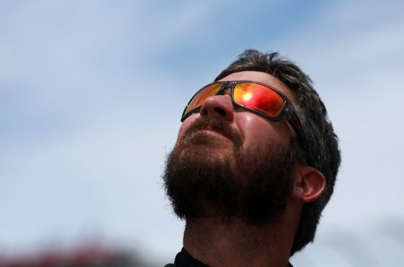 DOVER, DELAWARE - MAY 16: Martin Truex Jr., driver of the #19 Reser's Fine Foods Toyota, watches the flyover during the NASCAR Cup Series Drydene 400 at Dover International Speedway on May 16, 2021 in Dover, Delaware. (Photo by Sean Gardner/Getty Images) | Getty Images