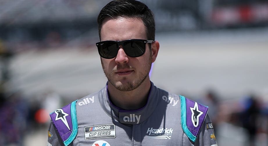 DOVER, DELAWARE - MAY 16: Alex Bowman, driver of the #48 Ally Chevrolet, walks the grid during the NASCAR Cup Series Drydene 400 at Dover International Speedway on May 16, 2021 in Dover, Delaware. (Photo by Sean Gardner/Getty Images) | Getty Images