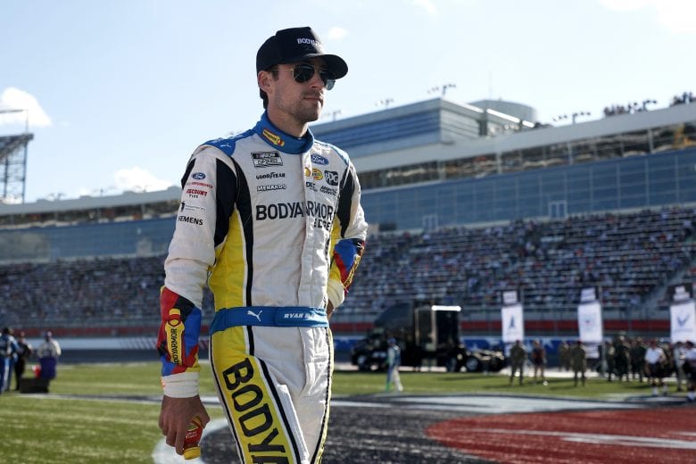 CONCORD, NORTH CAROLINA - MAY 30: Ryan Blaney, driver of the #12 BodyArmor EDGE WFord, walks the grid prior to the NASCAR Cup Series Coca-Cola 600 at Charlotte Motor Speedway on May 30, 2021 in Concord, North Carolina. (Photo by Maddie Meyer/Getty Images) | Getty Images
