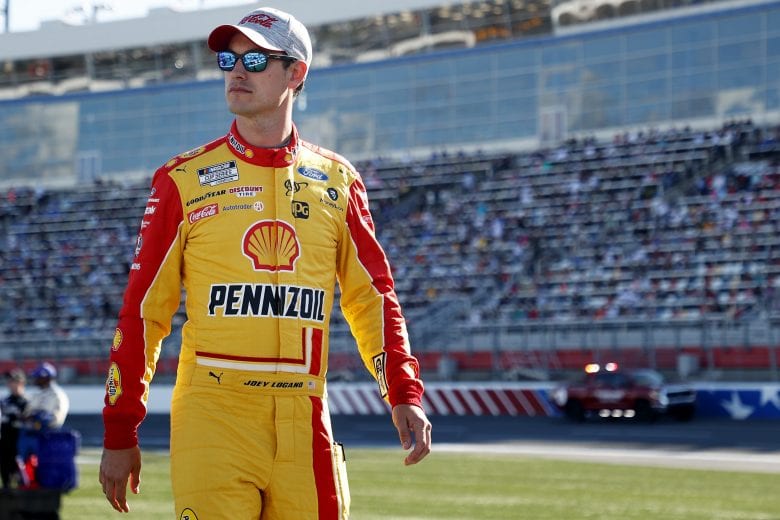 CONCORD, NORTH CAROLINA - MAY 30: Joey Logano, driver of the #22 Shell Pennzoil Ford, walks the grid prior to the NASCAR Cup Series Coca-Cola 600 at Charlotte Motor Speedway on May 30, 2021 in Concord, North Carolina. (Photo by Maddie Meyer/Getty Images) | Getty Images