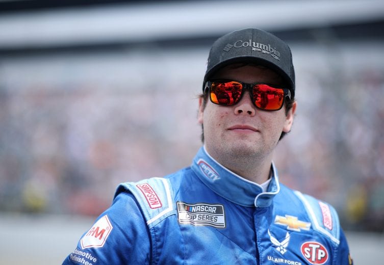 DOVER, DELAWARE - MAY 16: Erik Jones, driver of the #43 Medallion Bank Chevrolet, walks the grid during the NASCAR Cup Series Drydene 400 at Dover International Speedway on May 16, 2021 in Dover, Delaware. (Photo by Sean Gardner/Getty Images) | Getty Images