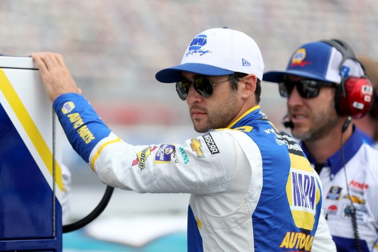 CONCORD, NORTH CAROLINA - MAY 29: Chase Elliott, driver of the #9 NAPA Auto Parts Chevrolet, and crew chief Alan Gustafson wait on the grid during qualifying for the NASCAR Cup Series Coca-Cola 600 at Charlotte Motor Speedway on May 29, 2021 in Concord, North Carolina. (Photo by Maddie Meyer/Getty Images) | Getty Images