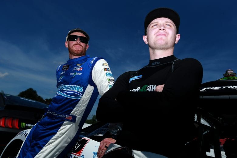 LEXINGTON, OHIO - JUNE 05: Jeb Burton, driver of the #10 Rocky Boots Chevrolet, (L) and Justin Haley, driver of the #11 LeafFilter Gutter Protection Chevrolet, wait on the grid prior to the NASCAR Xfinity Series B&L Transport 170 at Mid-Ohio Sports Car Course on June 05, 2021 in Lexington, Ohio. (Photo by Sean Gardner/Getty Images) | Getty Images