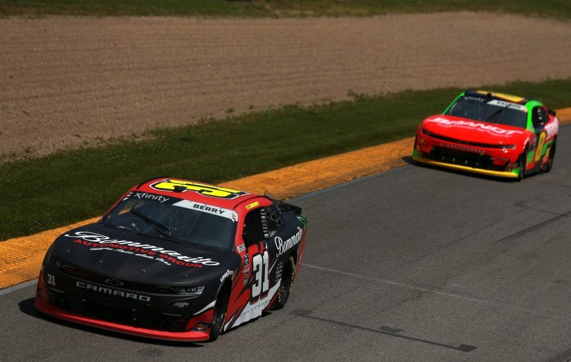 LEXINGTON, OHIO - JUNE 05: Josh Berry, driver of the #31 Bommarito Automotive Group Chevrolet, and Miguel Paludo, driver of the #8 BRANDT Chevrolet, race during the NASCAR Xfinity Series B&L Transport 170 at Mid-Ohio Sports Car Course on June 05, 2021 in Lexington, Ohio. (Photo by Sean Gardner/Getty Images) | Getty Images