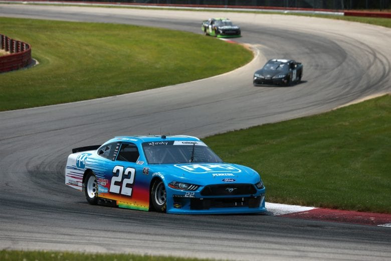 LEXINGTON, OHIO - JUNE 05: Austin Cindric, driver of the #22 PPG Ford, leads the field during the NASCAR Xfinity Series B&L Transport 170 at Mid-Ohio Sports Car Course on June 05, 2021 in Lexington, Ohio. (Photo by Sean Gardner/Getty Images) | Getty Images