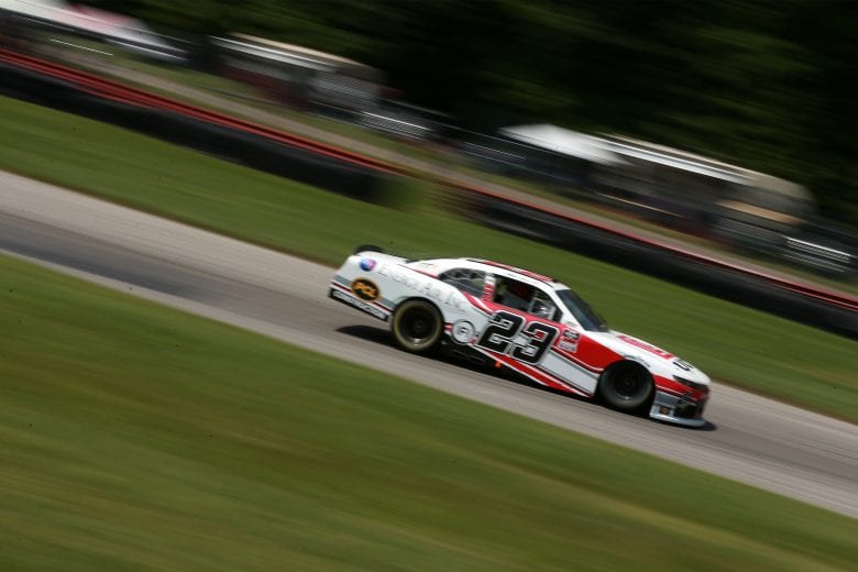 LEXINGTON, OHIO - JUNE 05: Andy Lally, driver of the #23 UCC/Energy Air Inc Chevrolet, drives during the NASCAR Xfinity Series B&L Transport 170 at Mid-Ohio Sports Car Course on June 05, 2021 in Lexington, Ohio. (Photo by Sean Gardner/Getty Images) | Getty Images