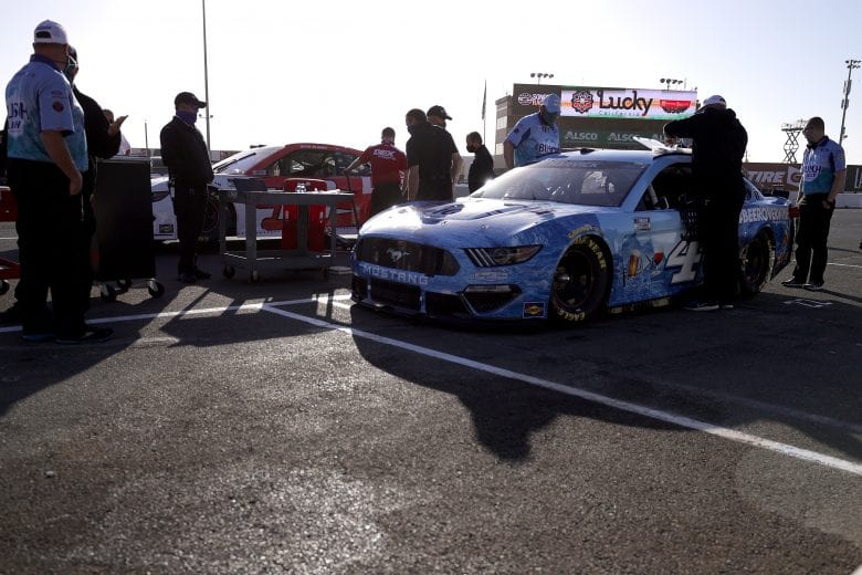 SONOMA, CALIFORNIA - JUNE 06: Crewmembers of the #4 Busch Light BeerOverWine Ford, driven by Kevin Harvick prepare for the NASCAR Cup Series Toyota/Save Mart 350 at Sonoma Raceway on June 06, 2021 in Sonoma, California. (Photo by Carmen Mandato/Getty Images) | Getty Images