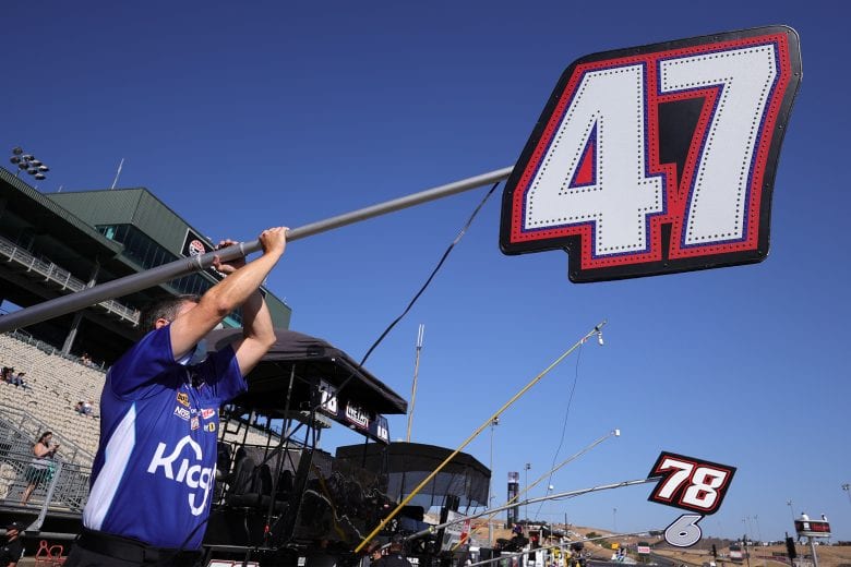 SONOMA, CALIFORNIA - JUNE 06: A crewmember of the #47 SunnyD Chevrolet, driven by Ricky Stenhouse Jr. prepare for the NASCAR Cup Series Toyota/Save Mart 350 at Sonoma Raceway on June 06, 2021 in Sonoma, California. (Photo by Carmen Mandato/Getty Images) | Getty Images
