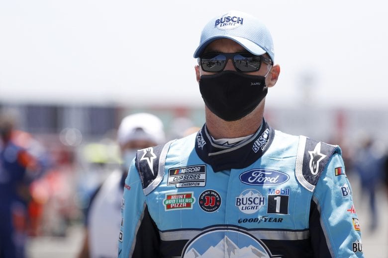 SONOMA, CALIFORNIA - JUNE 06: Kevin Harvick, driver of the #4 Busch Light #BeerOverWine Ford, walks the grid prior to the NASCAR Cup Series Toyota/Save Mart 350 at Sonoma Raceway on June 06, 2021 in Sonoma, California. (Photo by Maddie Meyer/Getty Images) | Getty Images