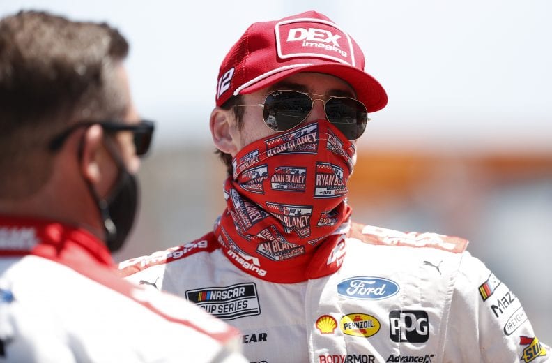SONOMA, CALIFORNIA - JUNE 06: Ryan Blaney, driver of the #12 DEX Imaging Ford, waits on the grid prior to the NASCAR Cup Series Toyota/Save Mart 350 at Sonoma Raceway on June 06, 2021 in Sonoma, California. (Photo by Maddie Meyer/Getty Images) | Getty Images