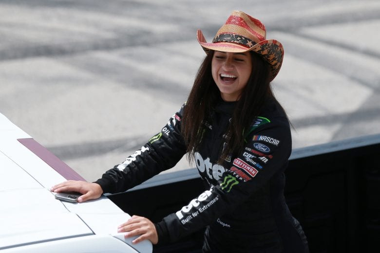 FORT WORTH, TEXAS - JUNE 12: Hailie Deegan, driver of the #1 Toter Ford,smiles during a  pre-race ride around prior to the NASCAR Camping World Truck Series SpeedyCash.com 220 at Texas Motor Speedway on June 12, 2021 in Fort Worth, Texas. (Photo by Sean Gardner/Getty Images) | Getty Images