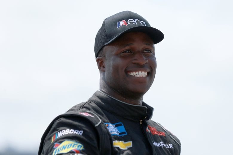FORT WORTH, TEXAS - JUNE 12: Jesse Iwuji, driver of the #34 eRacing Association/Gap Em Toyota, smiles during pre-race ceremonies prior to the NASCAR Camping World Truck Series SpeedyCash.com 220 at Texas Motor Speedway on June 12, 2021 in Fort Worth, Texas. (Photo by Sean Gardner/Getty Images) | Getty Images