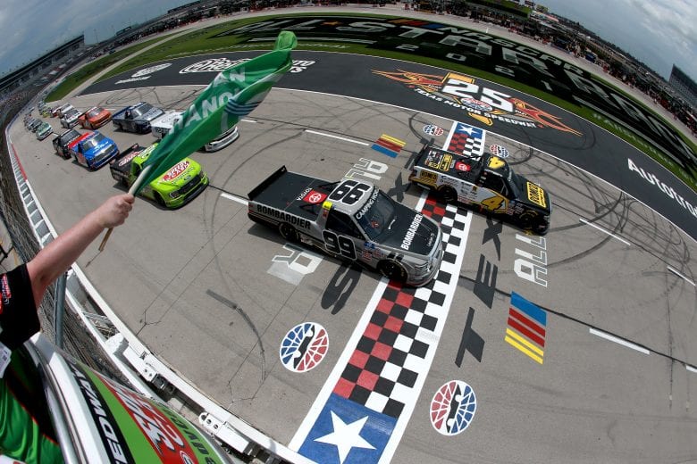 FORT WORTH, TEXAS - JUNE 12: Ben Rhodes, driver of the #99 Bombardier LearJet 75 Toyota,and John Hunter Nemechek, driver of the #4 ROMCO Toyota, lead the field to the green flag to start the NASCAR Camping World Truck Series SpeedyCash.com 220 at Texas Motor Speedway on June 12, 2021 in Fort Worth, Texas. (Photo by Sean Gardner/Getty Images) | Getty Images