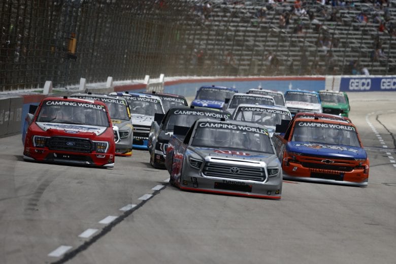FORT WORTH, TEXAS - JUNE 12: Johnny Sauter, driver of the #13 AHI Facility Services Toyota, Sheldon Creed, driver of the #2 Liftkits4less.com Chevrolet, and Tanner Gray, driver of the #15 Ford Performance Ford, race during the NASCAR Camping World Truck Series SpeedyCash.com 220 at Texas Motor Speedway on June 12, 2021 in Fort Worth, Texas. (Photo by Jared C. Tilton/Getty Images) | Getty Images