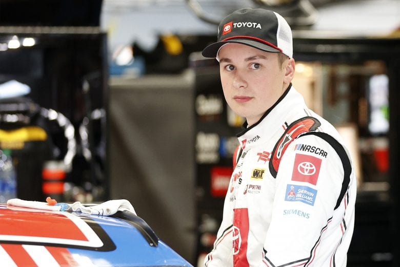 CONCORD, NORTH CAROLINA - MAY 28: Christopher Bell, driver of the #20 Honoring Our Fallen Heroes Toyota, waits in the garage area during practice for the NASCAR Cup Series Coca-Cola 600 at Charlotte Motor Speedway on May 28, 2021 in Concord, North Carolina. (Photo by Maddie Meyer/Getty Images) | Getty Images