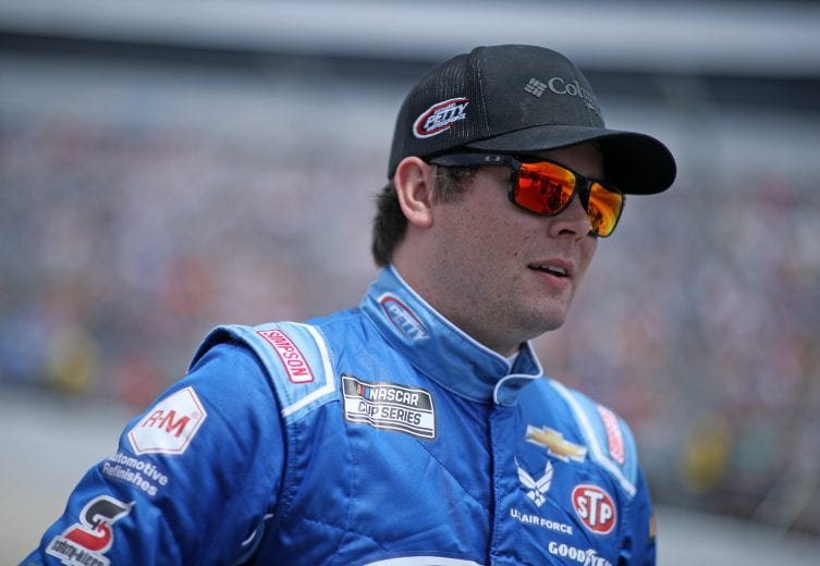 DOVER, DELAWARE - MAY 16: Erik Jones, driver of the #43 Medallion Bank Chevrolet, walks the grid during the NASCAR Cup Series Drydene 400 at Dover International Speedway on May 16, 2021 in Dover, Delaware. (Photo by Sean Gardner/Getty Images) | Getty Images