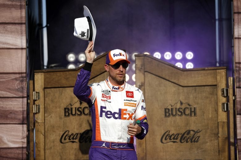 FORT WORTH, TEXAS - JUNE 13: Denny Hamlin, driver of the #11 FedEx Office Toyota, walks on stage during driver intros prior to the NASCAR All-Star Race at Texas Motor Speedway on June 13, 2021 in Fort Worth, Texas. (Photo by Chris Graythen/Getty Images) | Getty Images
