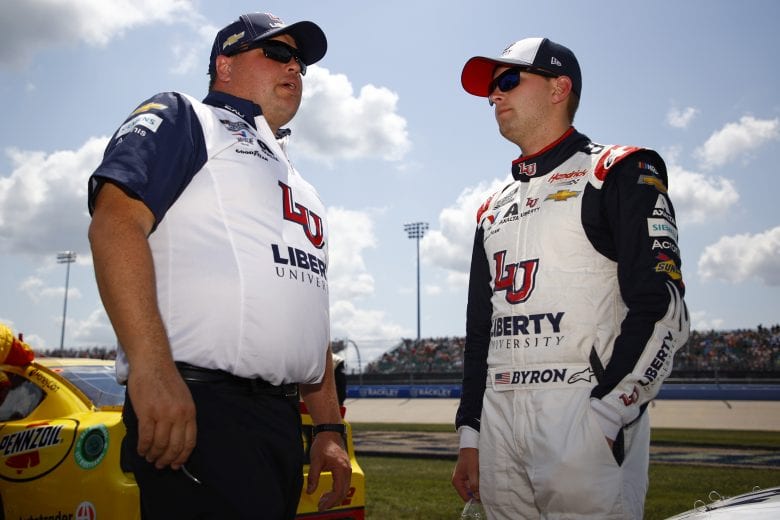 LEBANON, TENNESSEE - JUNE 20: William Byron, driver of the #24 Liberty University Chevrolet, and crew chief Rudy Fugle talk on the grid prior to the NASCAR Cup Series Ally 400 at Nashville Superspeedway on June 20, 2021 in Lebanon, Tennessee. (Photo by Jared C. Tilton/Getty Images) | Getty Images