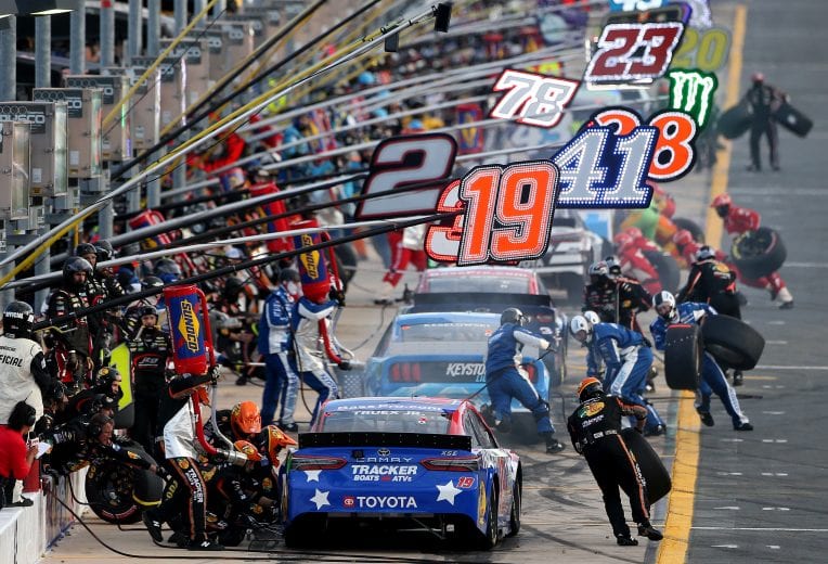 CONCORD, NORTH CAROLINA - MAY 30: Martin Truex Jr., driver of the #19 Bass Pro Shops Red White Blue Toyota, pits during the NASCAR Cup Series Coca-Cola 600 at Charlotte Motor Speedway on May 30, 2021 in Concord, North Carolina. (Photo by Brian Lawdermilk/Getty Images) | Getty Images