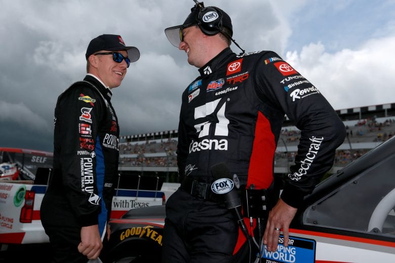 LONG POND, PENNSYLVANIA - JUNE 26: John Hunter Nemechek, driver of the #4 Power Up Premium Trail Mix Toyota, (L) and Kyle Busch, driver of the #51 Cessna Toyota, talk on the grid prior to the NASCAR Camping World Truck Series CRC Brakleen 150 at Pocono Raceway on June 26, 2021 in Long Pond, Pennsylvania. (Photo by Sean Gardner/Getty Images) | Getty Images